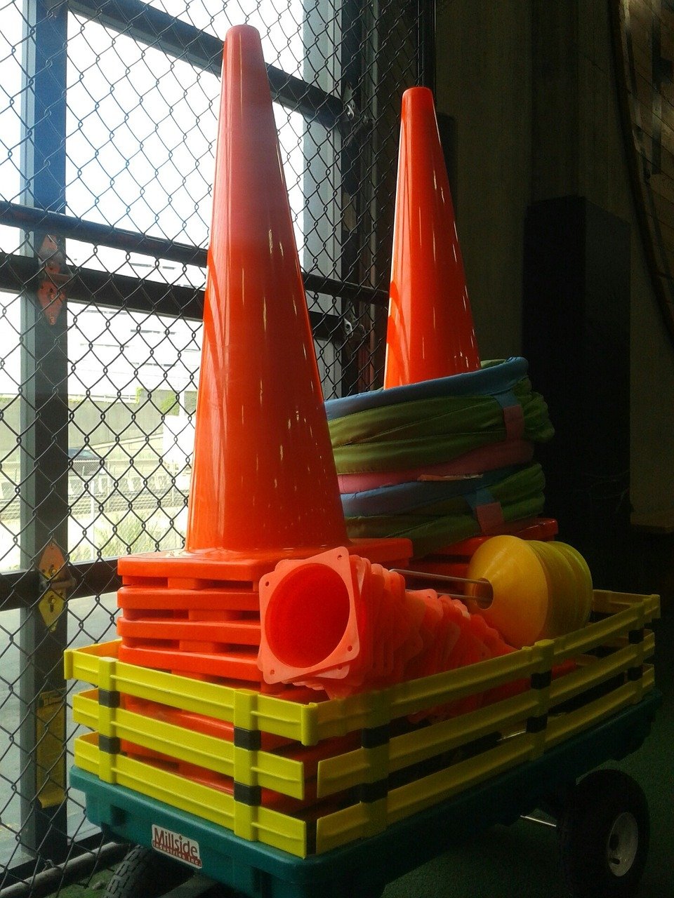 Tall orange football cones